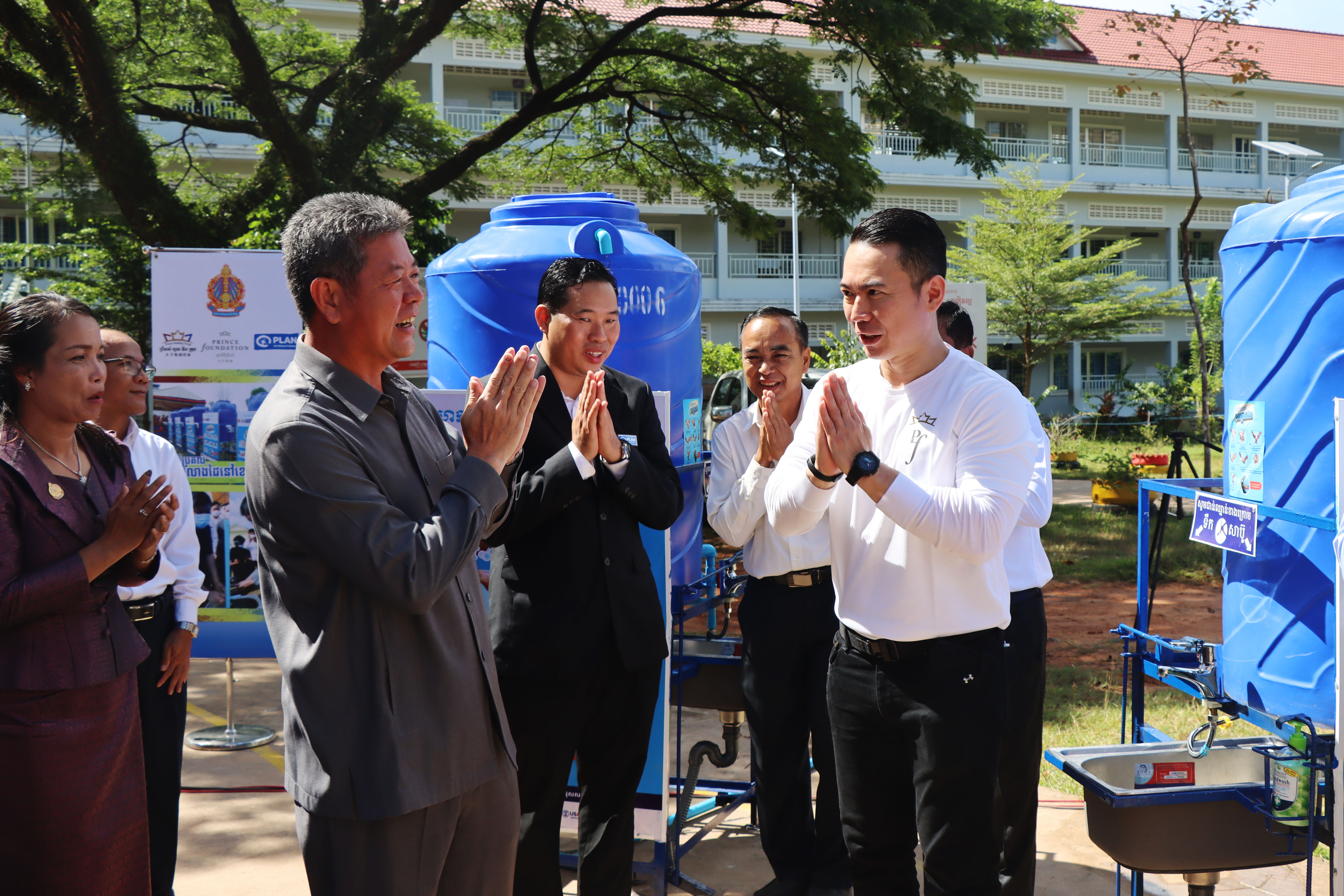 Official handover of hand washing stations to the schools