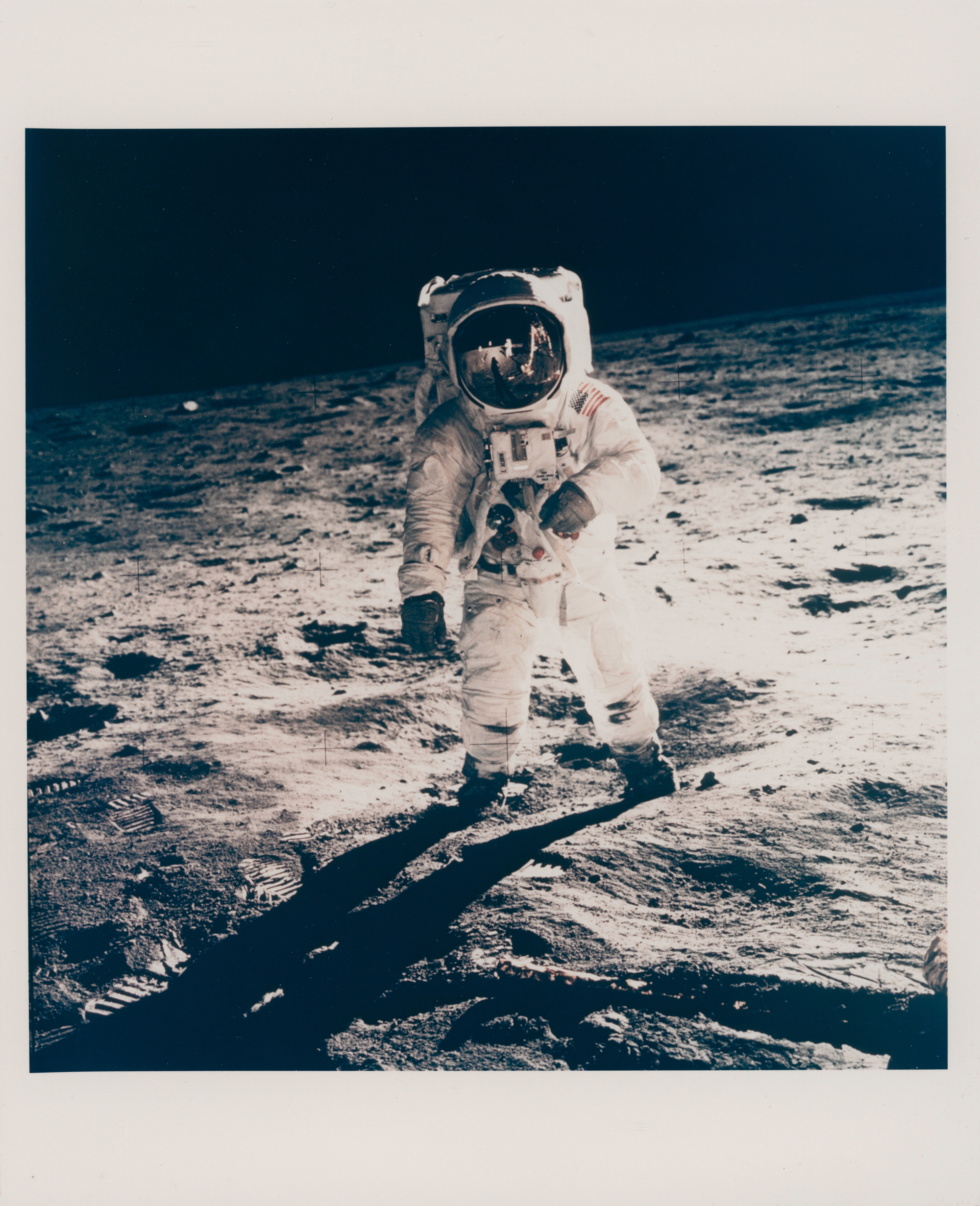 Buzz Aldrin's gold plated sun visor reflects the photographer and the LM Eagle, Vintage-chromogenetic print on fiber-based, paper, printed 1969 (NASA AS11-40-5903), 20.3 x 25.4 cm DOROTHEUM